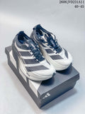 Pair of white and gray Adidas Adizero Dropset Elite shoes on a branded box