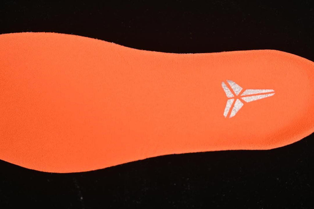 Close-up of orange insole with Kobe logo
