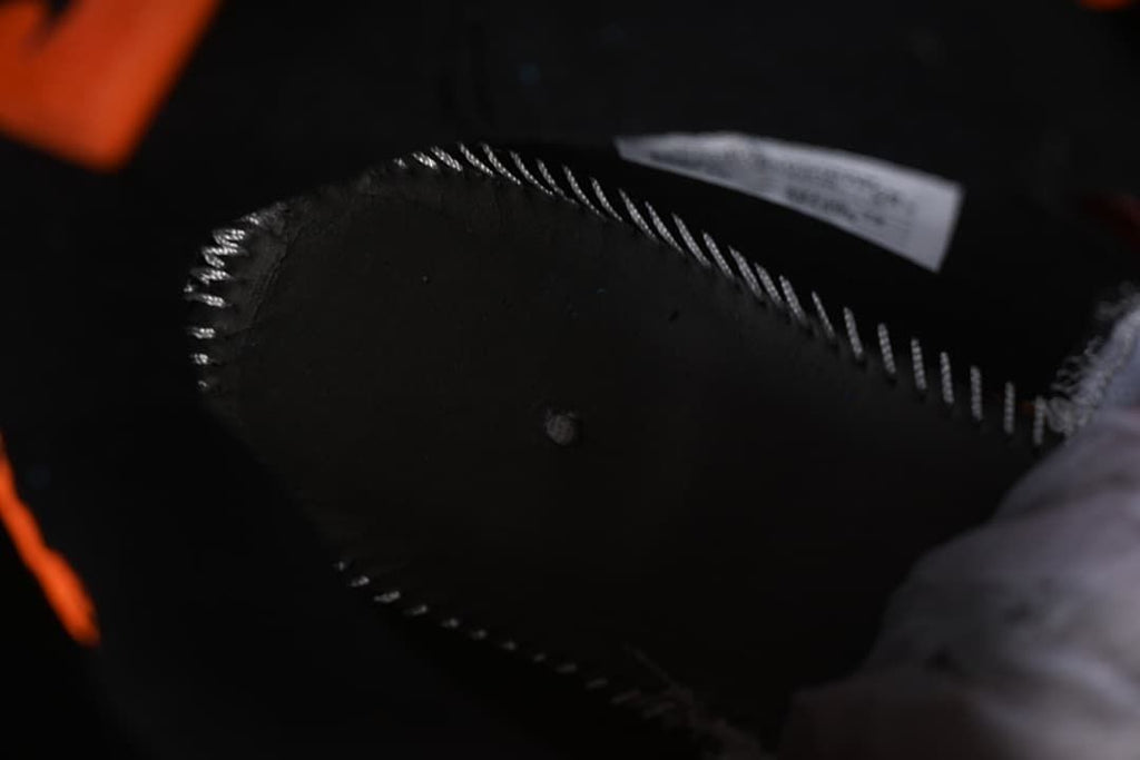 Close-up inside the shoe showing the interior and stitching.