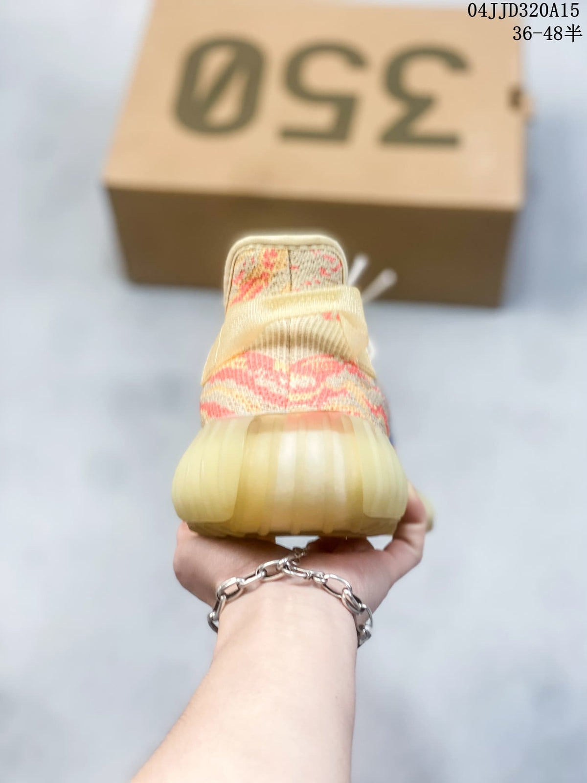 Rear view of the sneaker showing the heel and translucent sole; image overlay shows sizes 36–48.5 and style code 04JJD320A15.