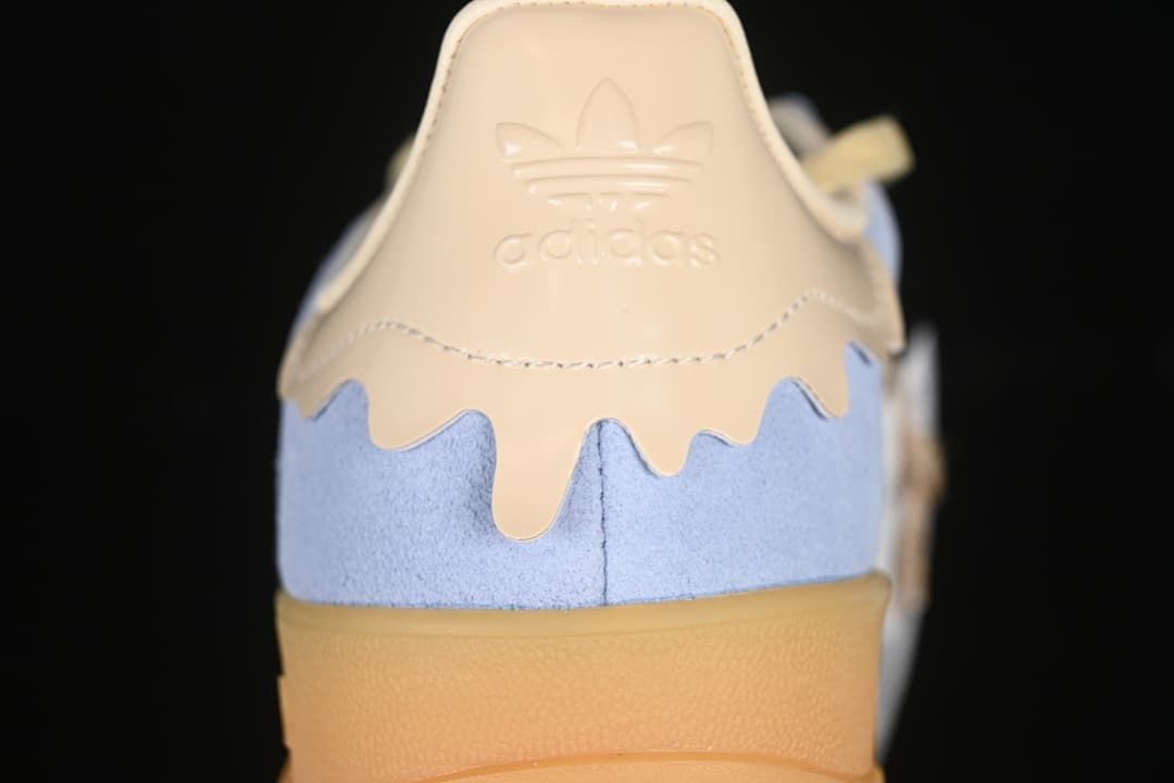 Rear view showing the cream heel tab and light blue heel panel
