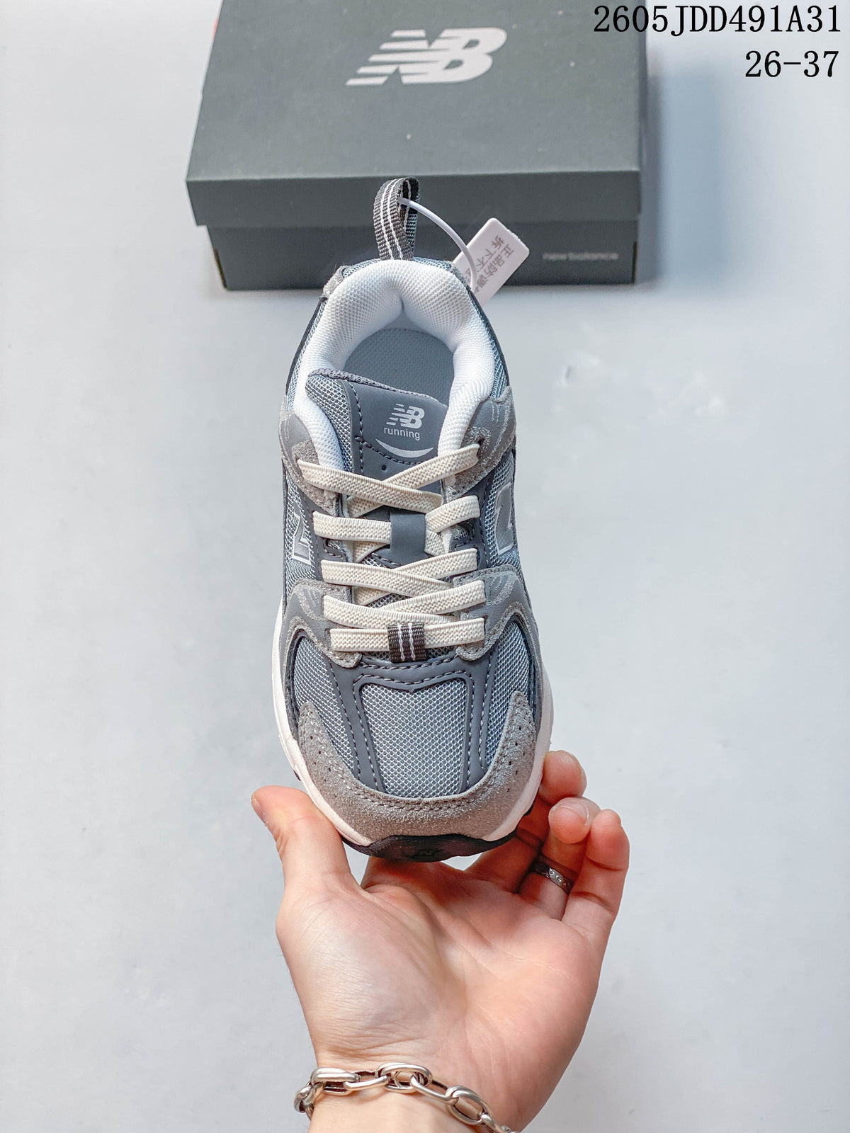 Top view of a gray lace-up kids' sneaker