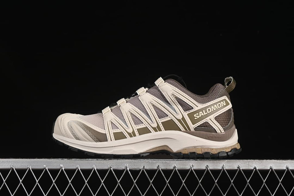 Side profile of the shoe against a dark background.