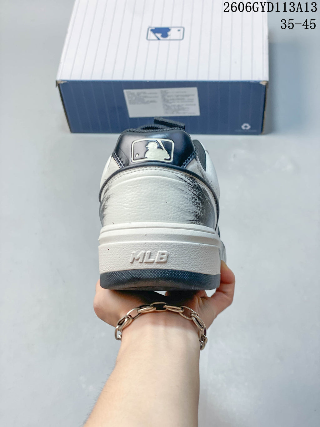 Rear view of the sneaker showing the raised sole and heel detail