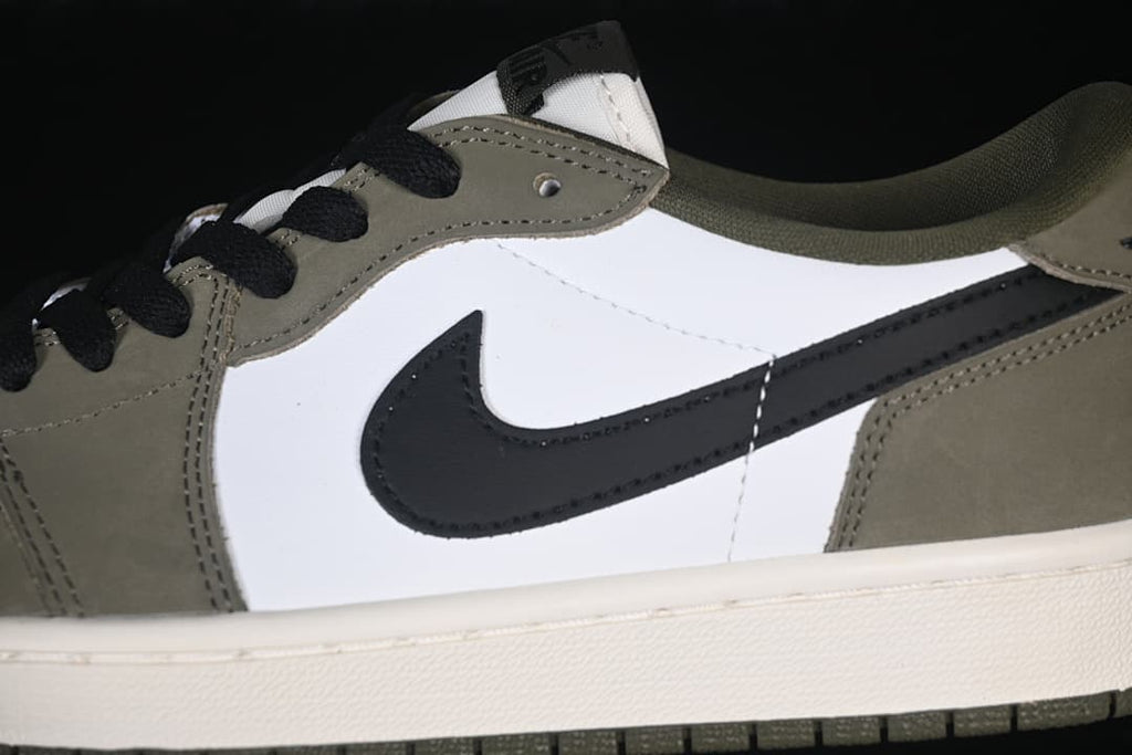 Close-up of the white side panel, black Swoosh, olive overlays, and laces