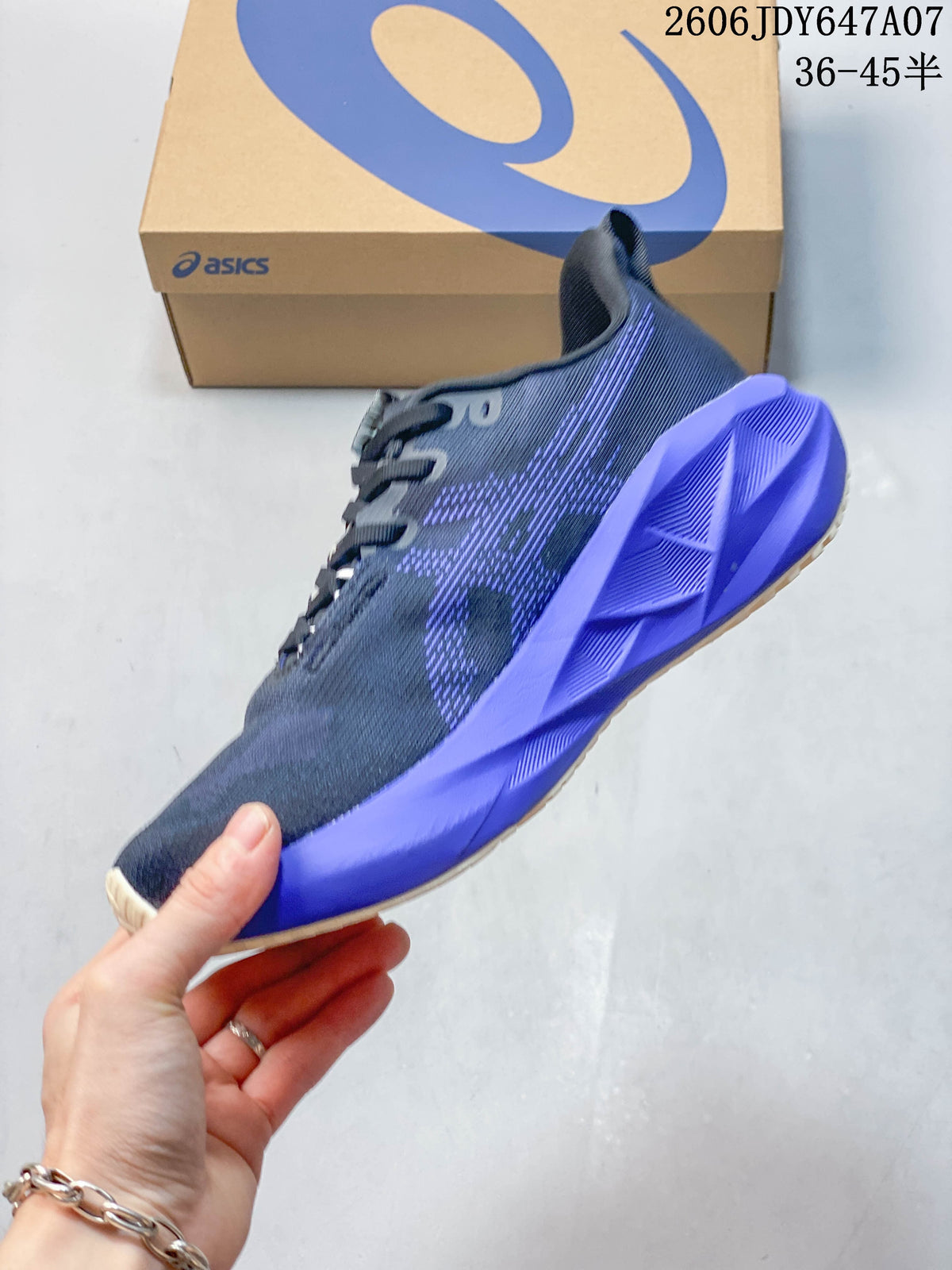 Side profile of a navy and purple running shoe