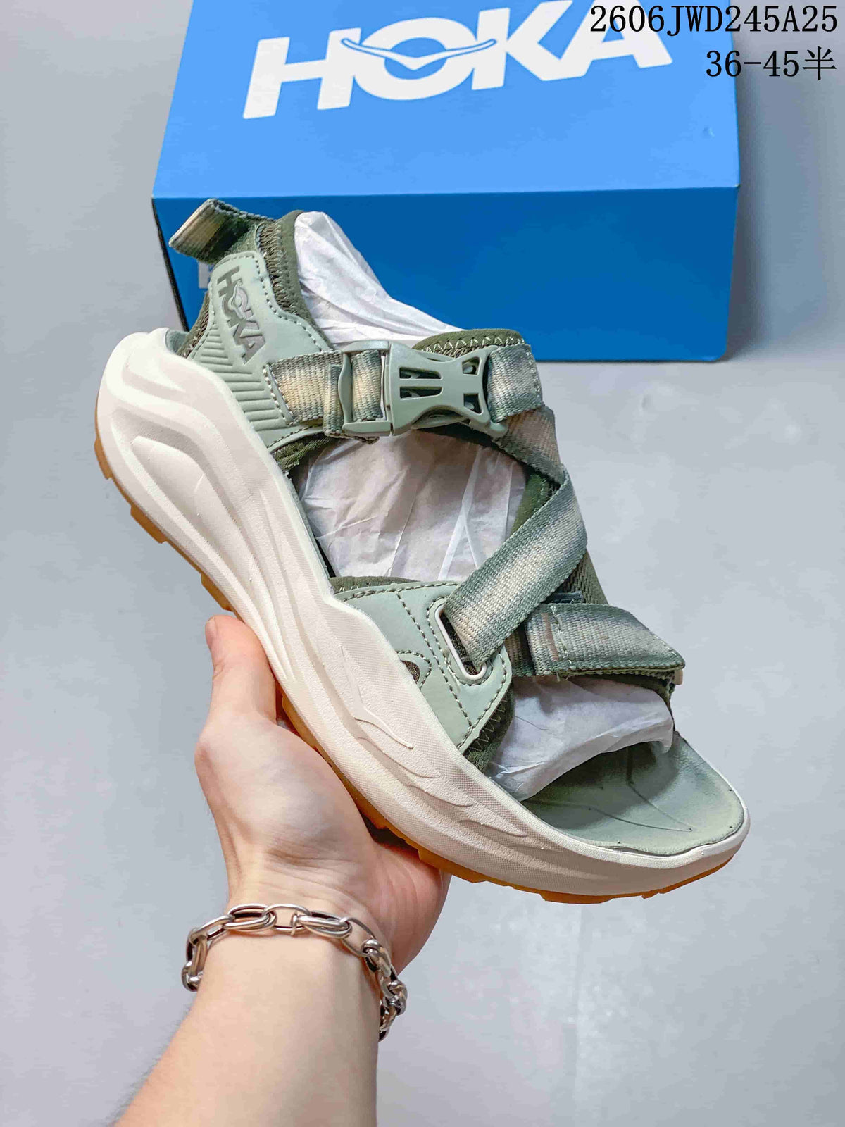 Sage green HOKA Infini Hike TC sandal with a light-colored sole