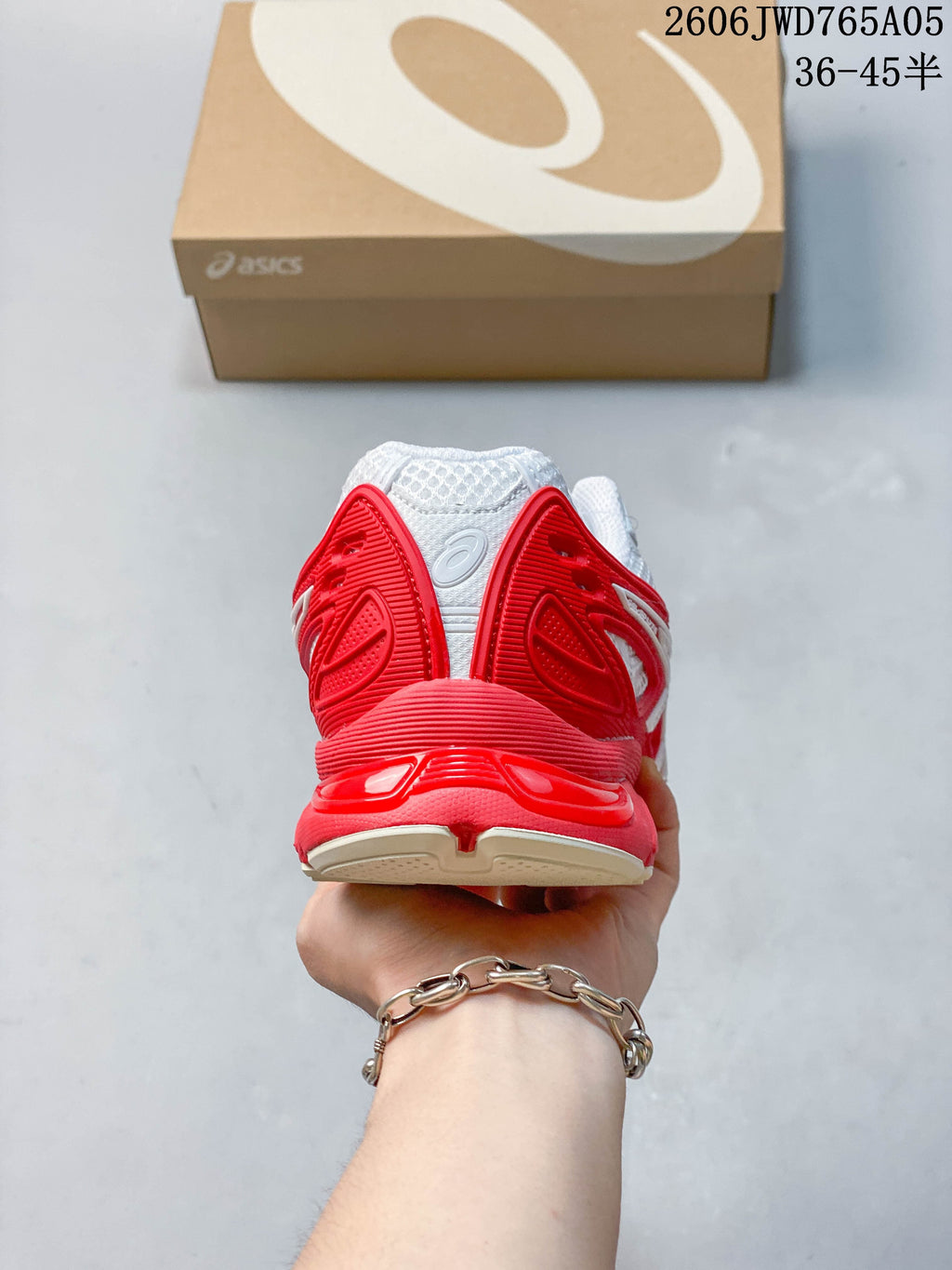 Rear view of the white and red ASICS Gel-TRUCK sneaker