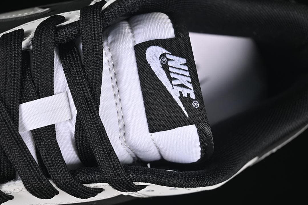 Close-up of the tongue label, laces, and padded collar