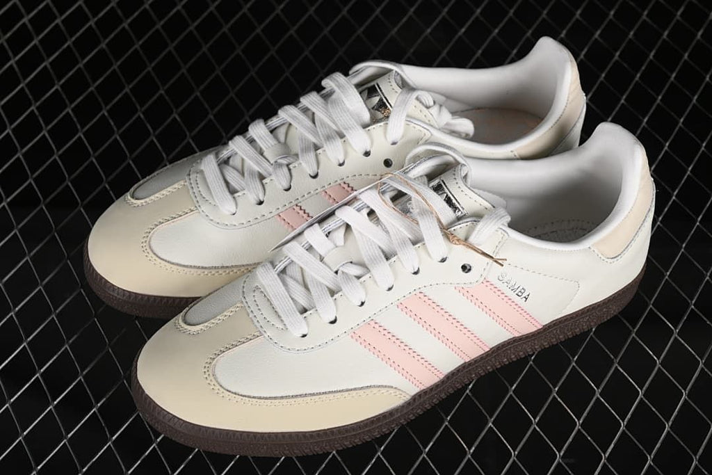 Pair of off-white and pink Samba low-top sneakers viewed from above