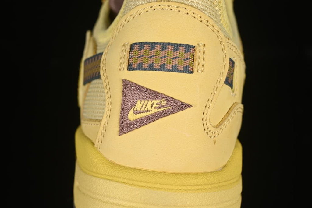 Rear heel detail with Nike branding and patterned fabric panels.