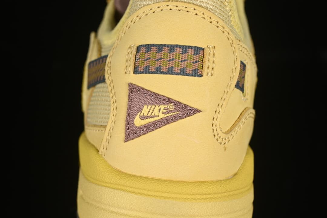 Rear heel detail with Nike branding and patterned fabric panels.