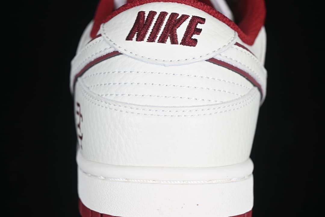 Rear view showing Nike heel tab and burgundy accents