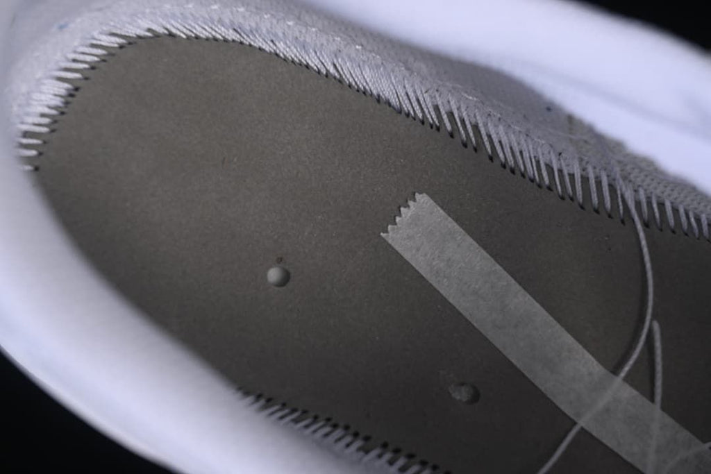 Close-up view inside the shoe showing stitching and interior construction