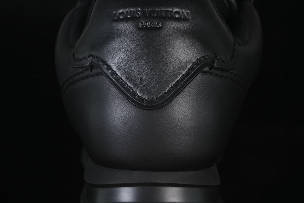 Rear view showing the heel panel and embossed lettering