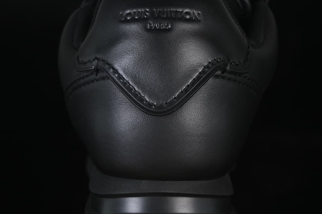 Rear view showing the heel panel and embossed lettering