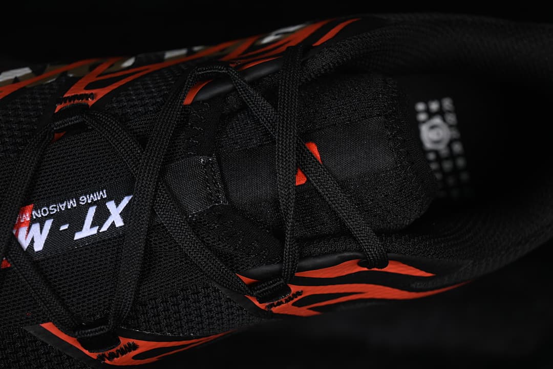 Top detail of the black laces, tongue, and XT-MM6 branding