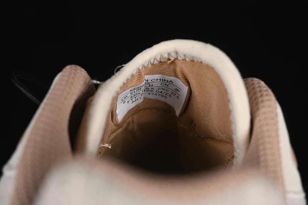 Close-up of the shoe collar and interior size label.