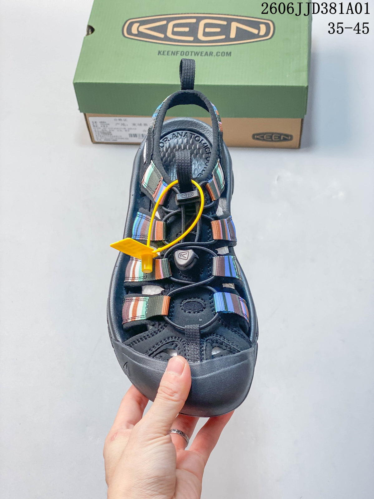 Top view showing the sandal's striped straps, cord closure, and protective toe bumper.