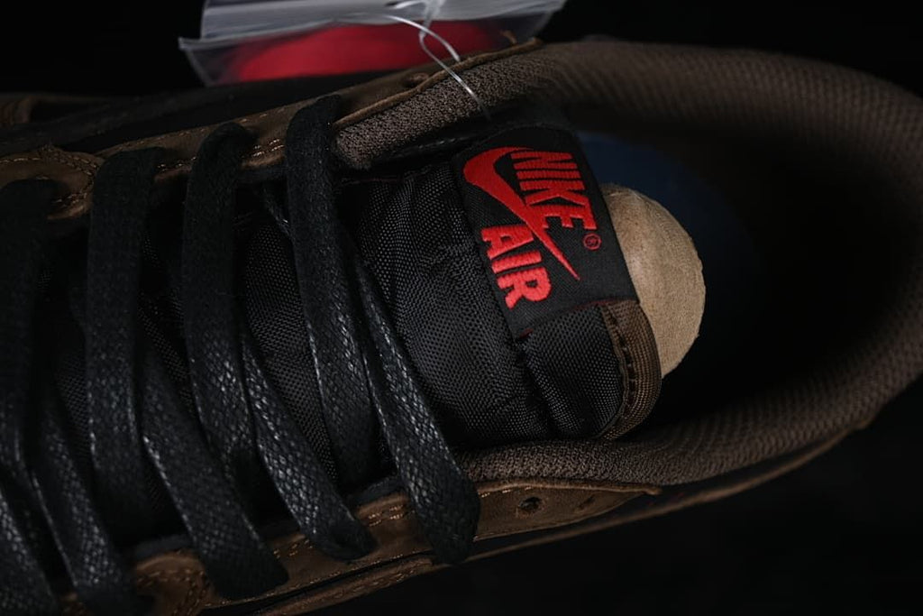 Close-up of black laces and tongue with red Nike Air lettering