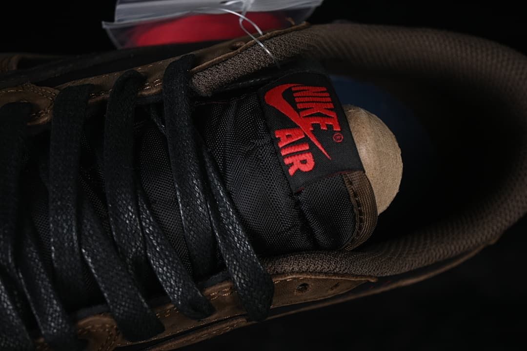 Close-up of black laces and tongue with red Nike Air lettering