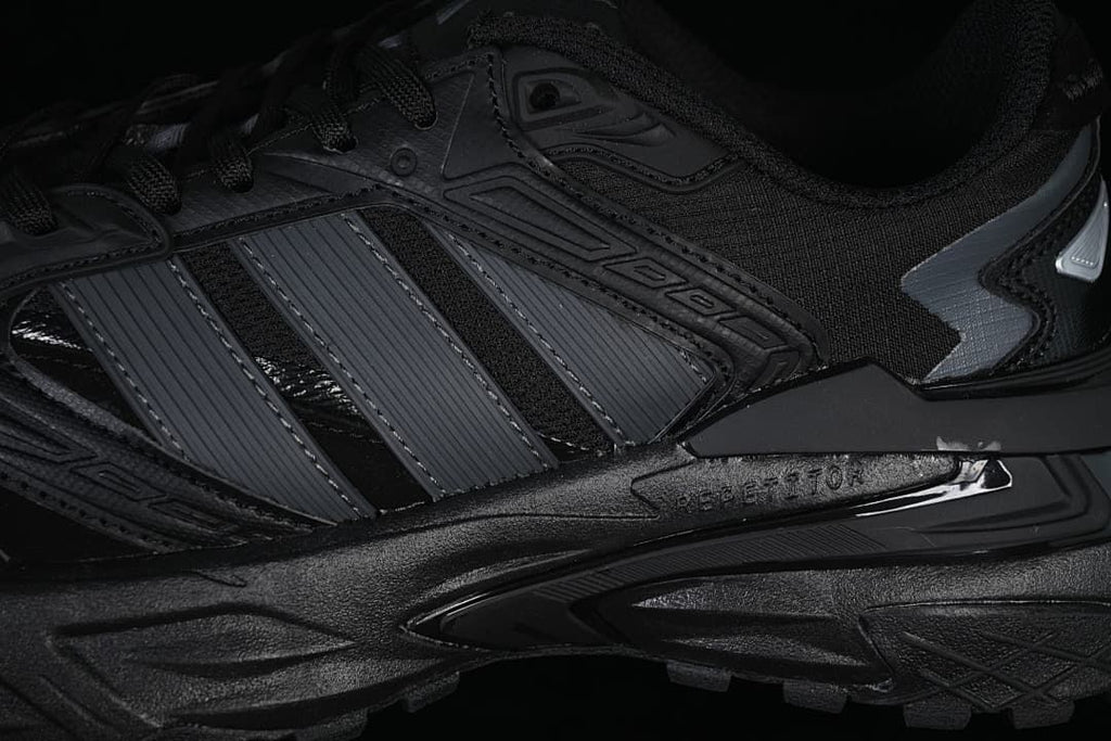 Close-up of the side stripes and layered midsole