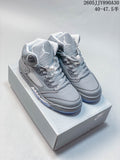 Pair of grey Jordan Air Jordan 5 Retro high-top sneakers on a shoebox