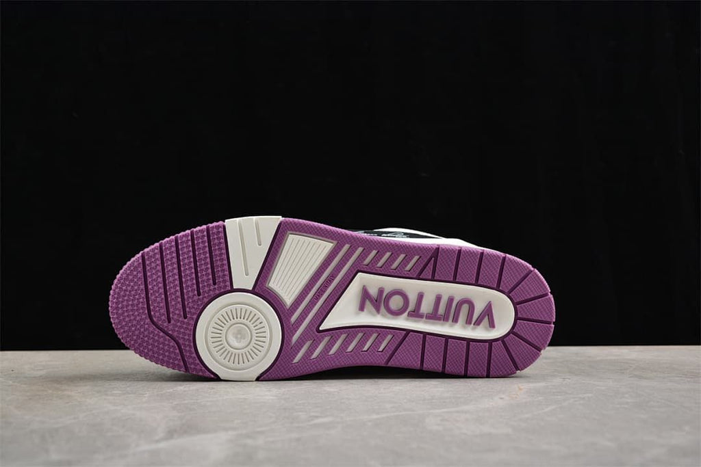Underside of the sneaker showing a purple-and-white patterned outsole