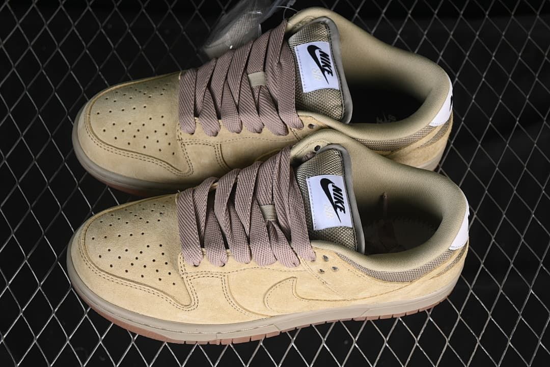Pair of tan Nike SB Dunk Low Pro B sneakers viewed from above