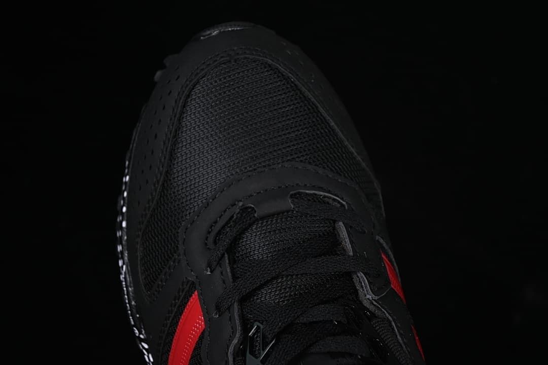 Top view of the black mesh toe and lace area.