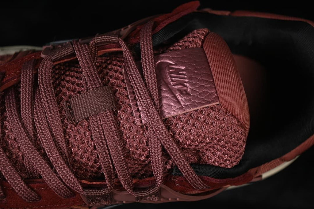 Top close-up of the laces, tongue, and textured upper