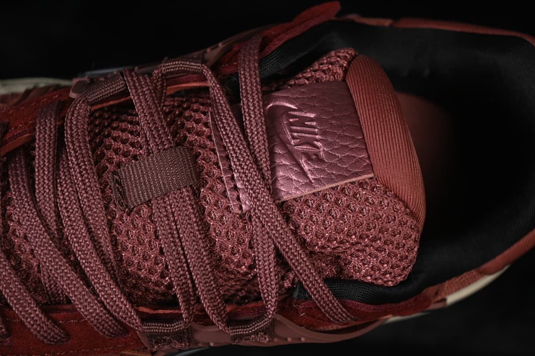 Top close-up of the laces, tongue, and textured upper