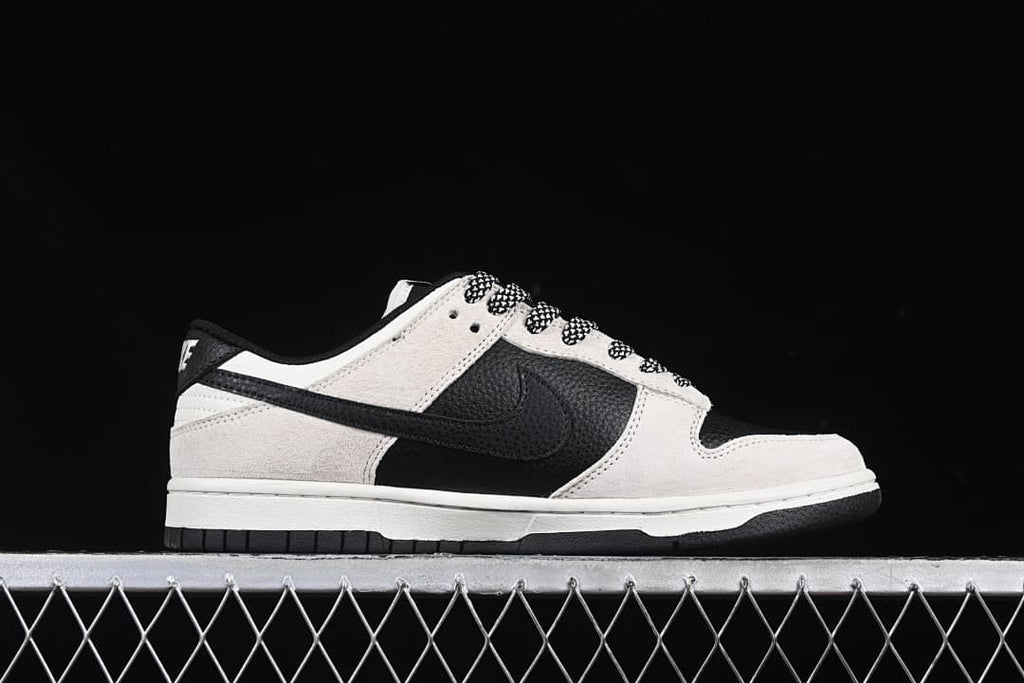 Side view showing the black Swoosh and off-white panels