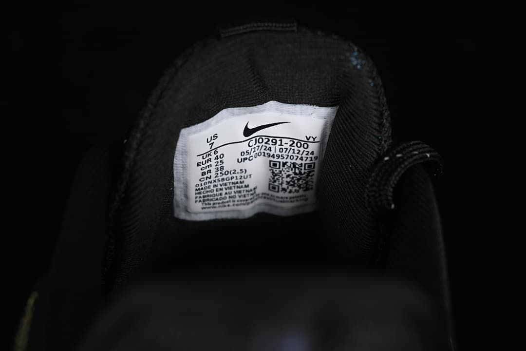 Close-up of the shoe label showing style code CJ0291-200 and size details