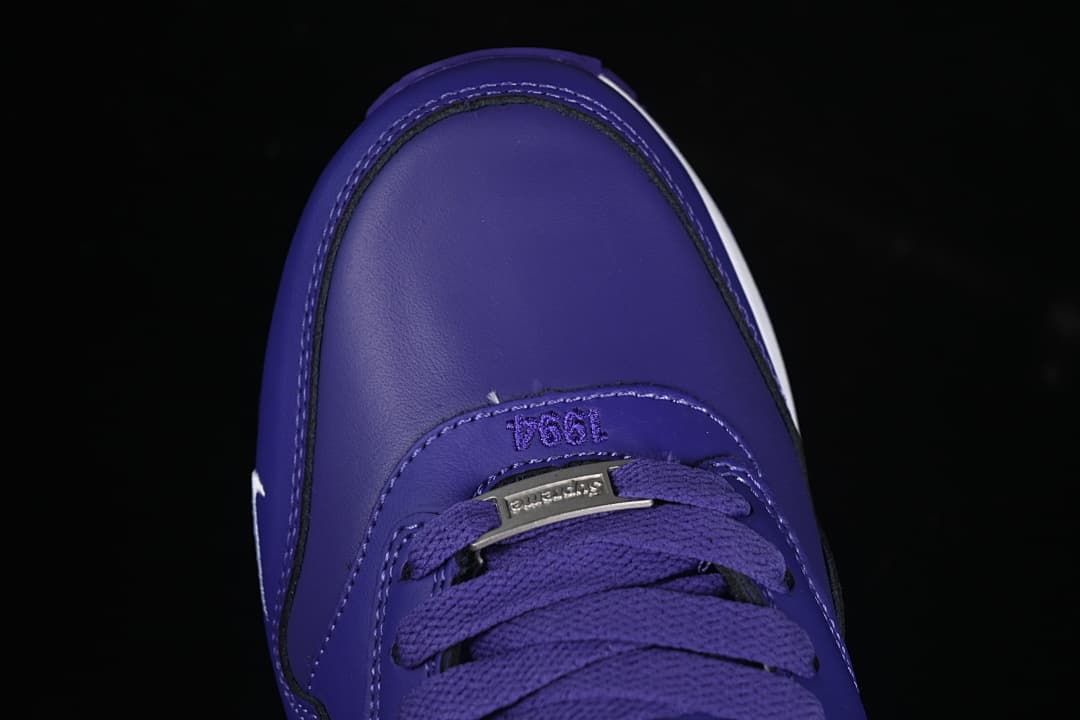 Top-down view of the purple toe and lacing area