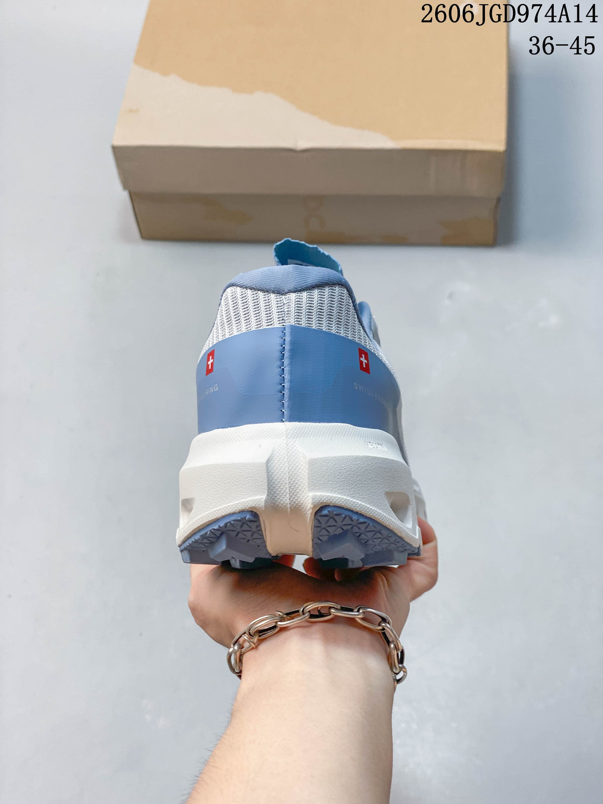 Rear view of a white and blue On Cloudvista 2 shoe