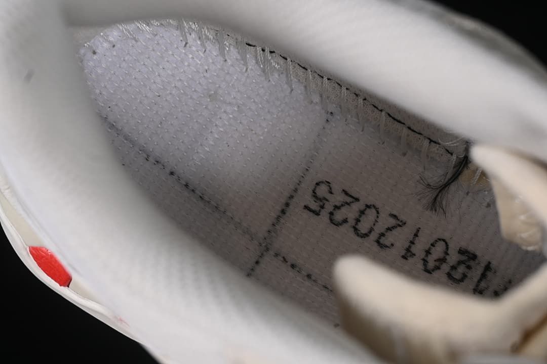 Interior close-up showing the shoe lining and a printed size marking.