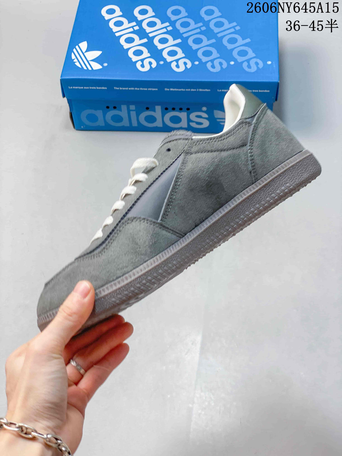 Side profile of the grey low-top sneaker