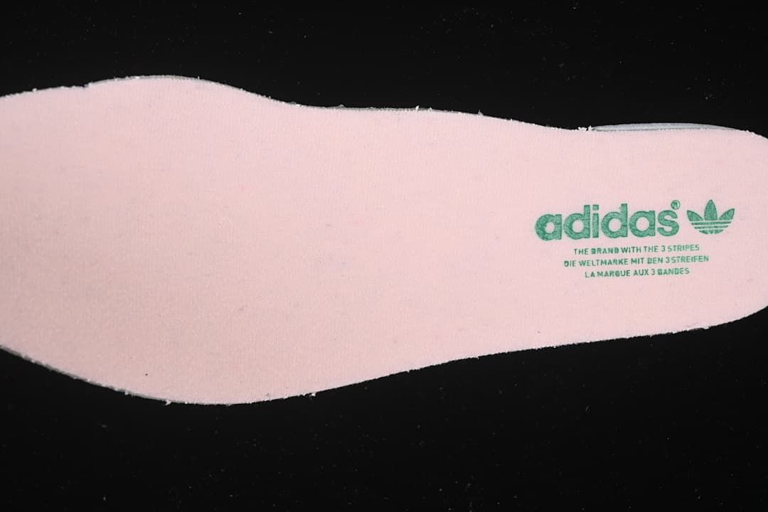Pink insole with adidas branding