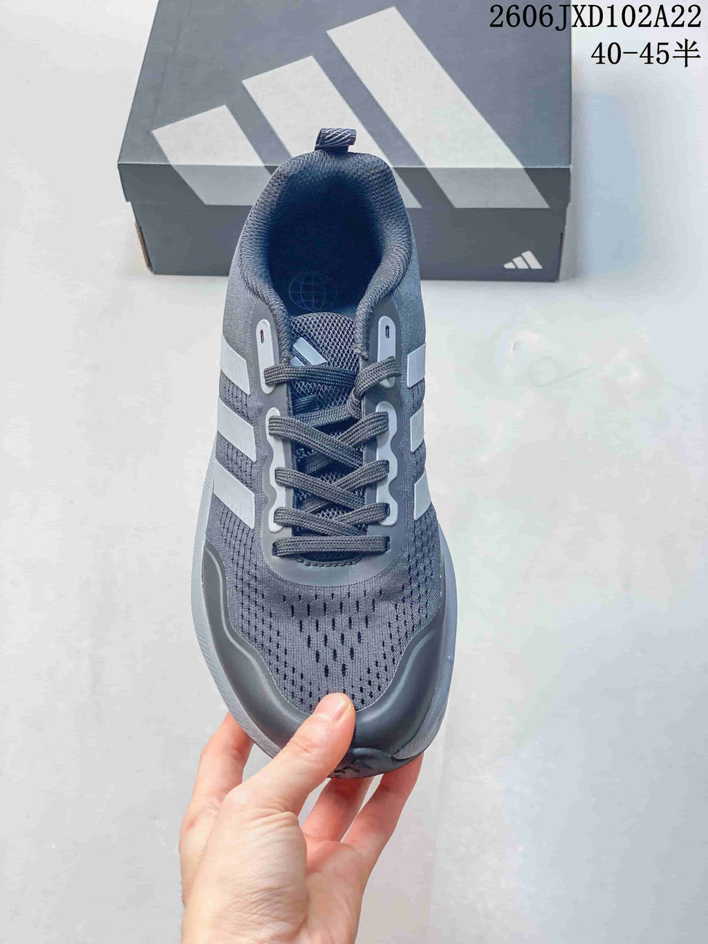 Top view of a gray Adidas lace-up shoe