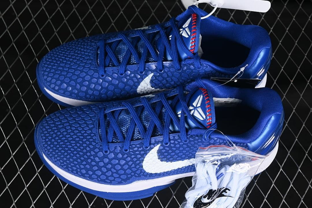 Pair of blue Nike Kobe VI Protro shoes shown from above at an angle