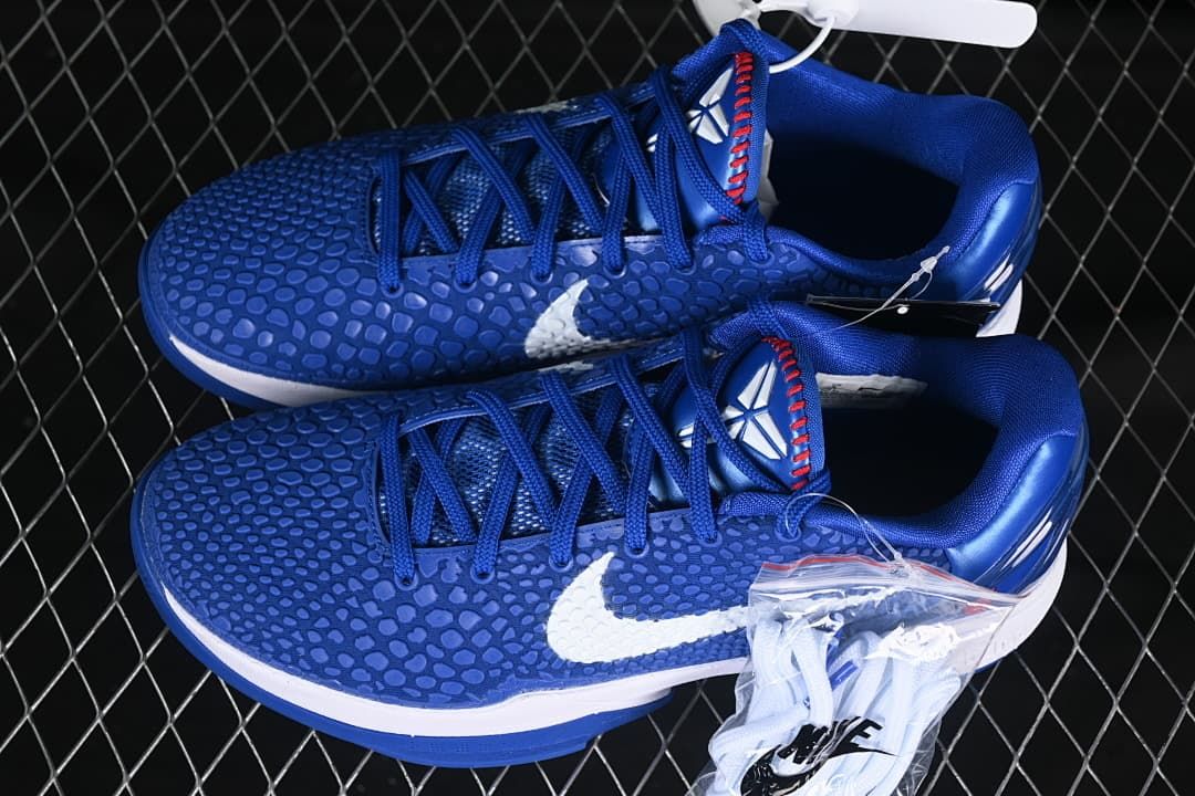 Pair of blue Nike Kobe VI Protro shoes shown from above at an angle