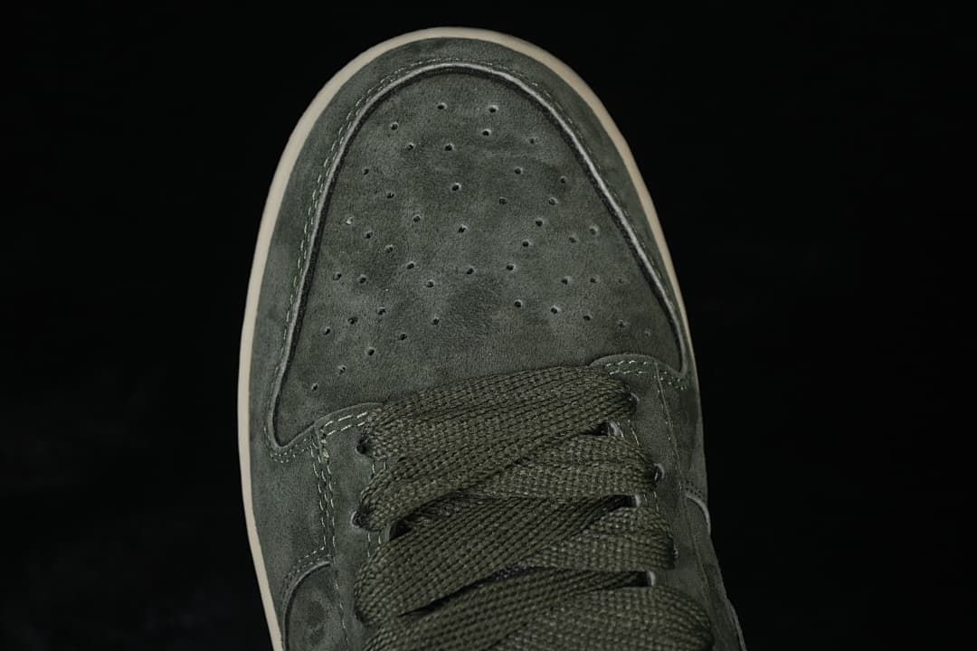 Top-down detail of the perforated toe box and laces