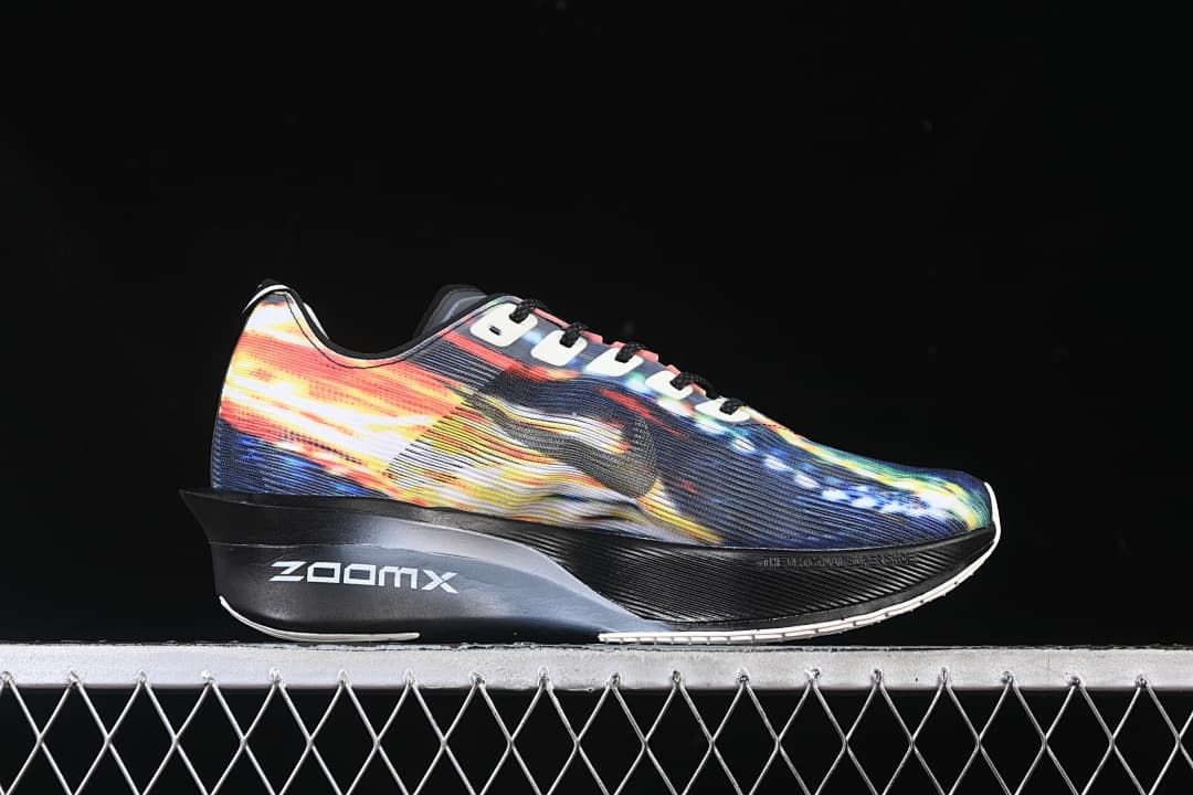Side view of the multicolor shoe with ZoomX lettering on the midsole