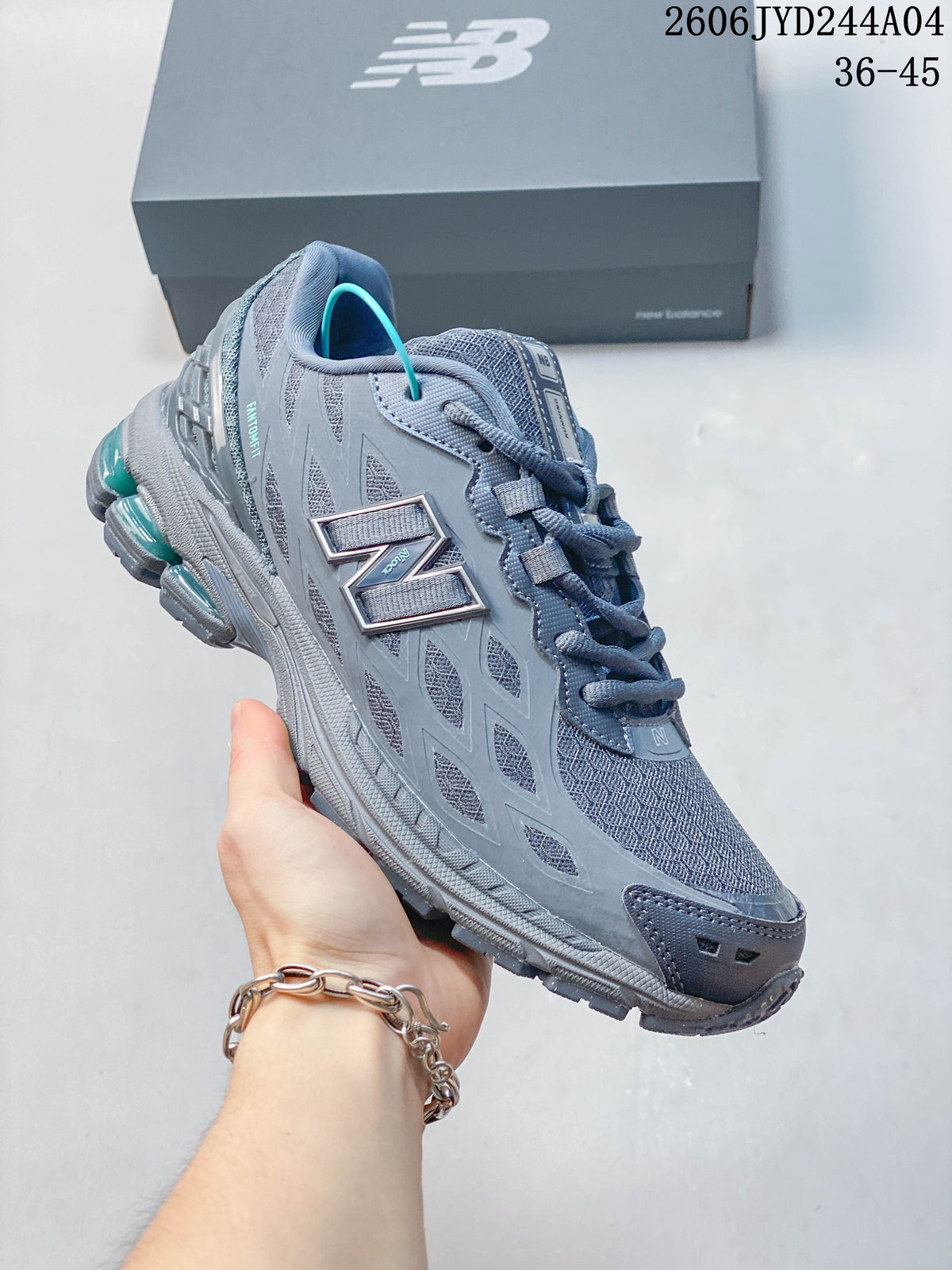 Side view of a blue-gray New Balance 1906R sneaker