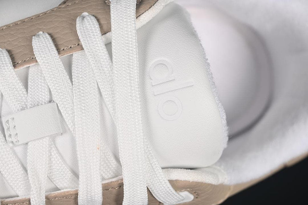 Close-up of the tongue and white laces