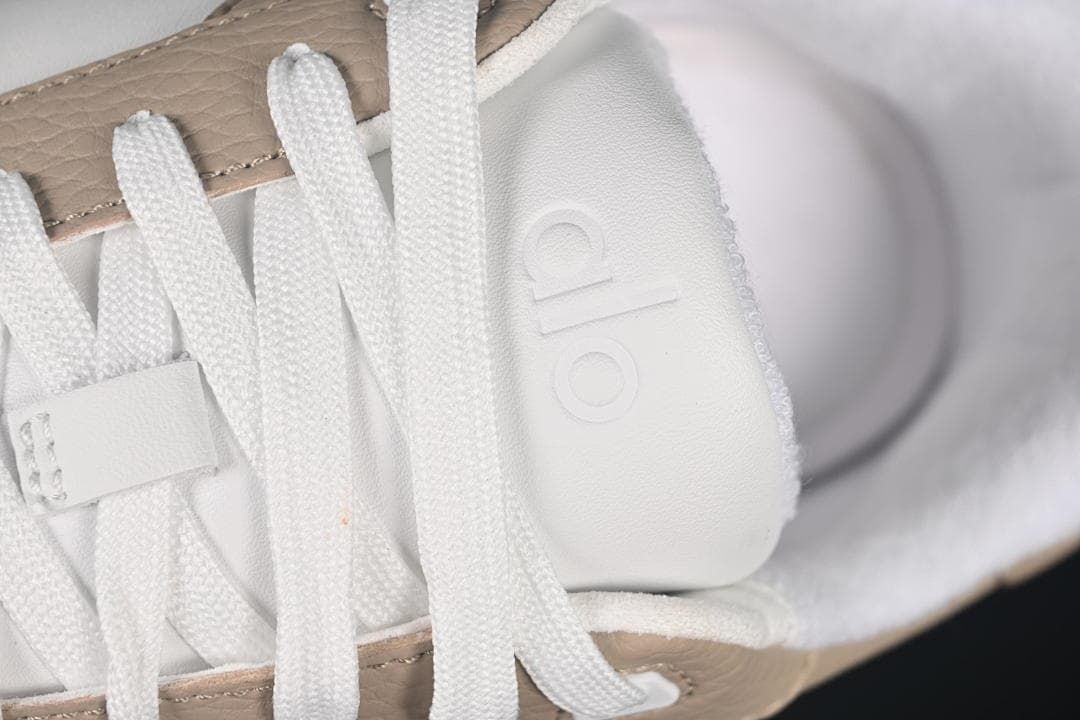 Close-up of the tongue and white laces