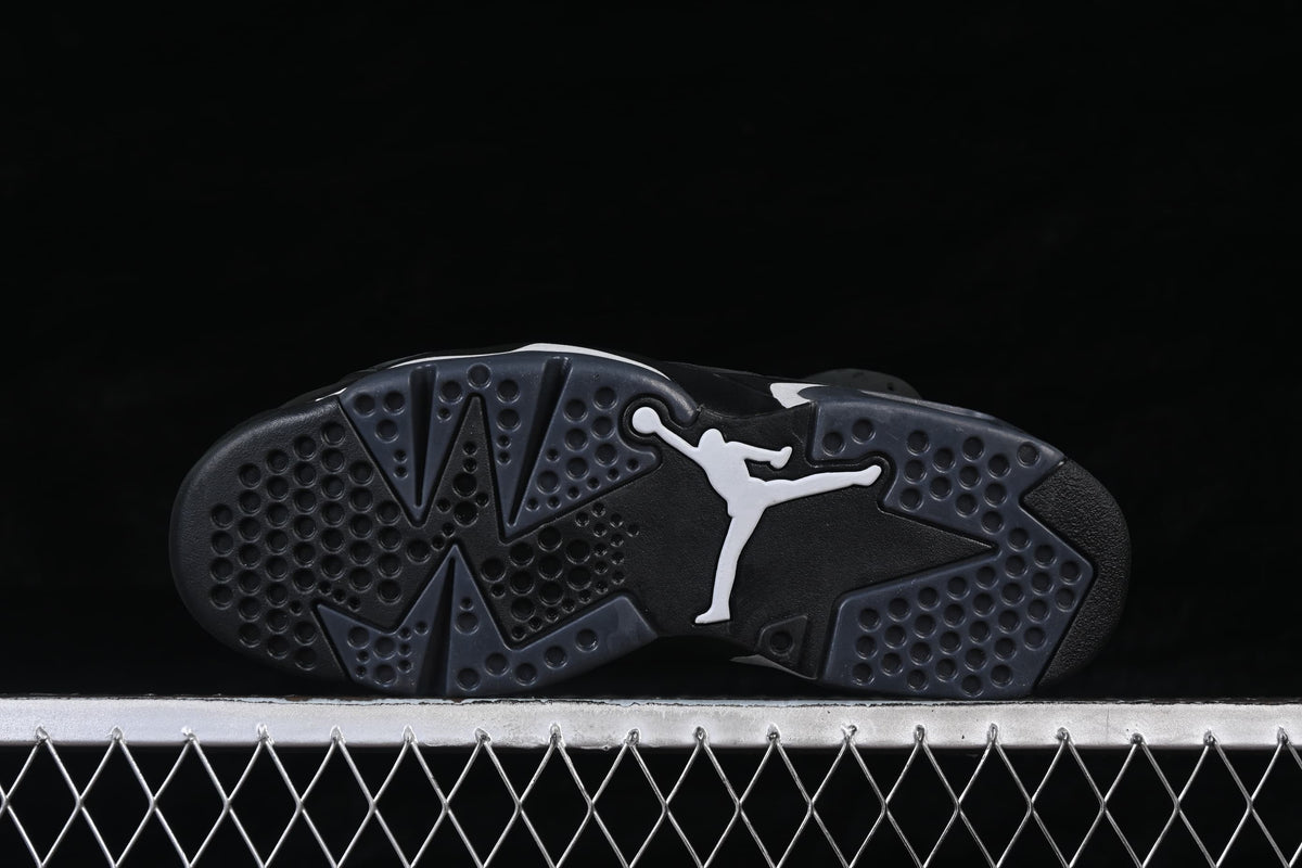 Underside of the sneaker showing a dark patterned outsole and contrasting Jumpman logo.