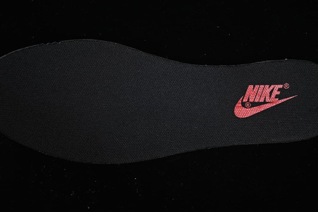 Close-up of the black insole with red Nike branding
