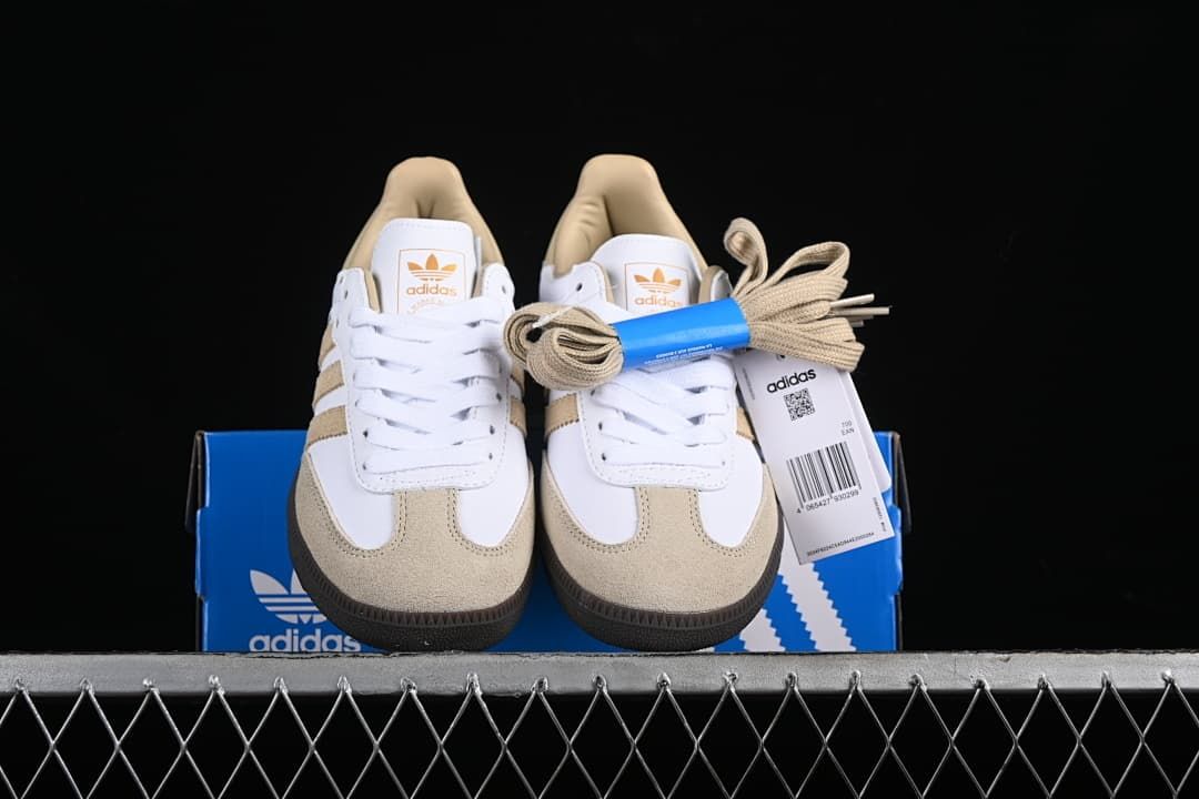Front view of the pair with white and beige panels and spare beige laces